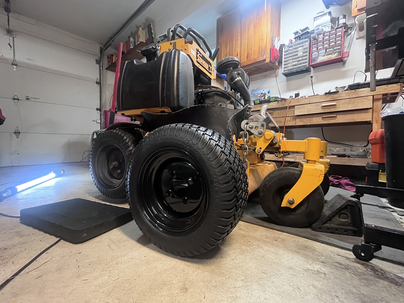 Commercial Wright stand-on mower in the MOWTOR workshop