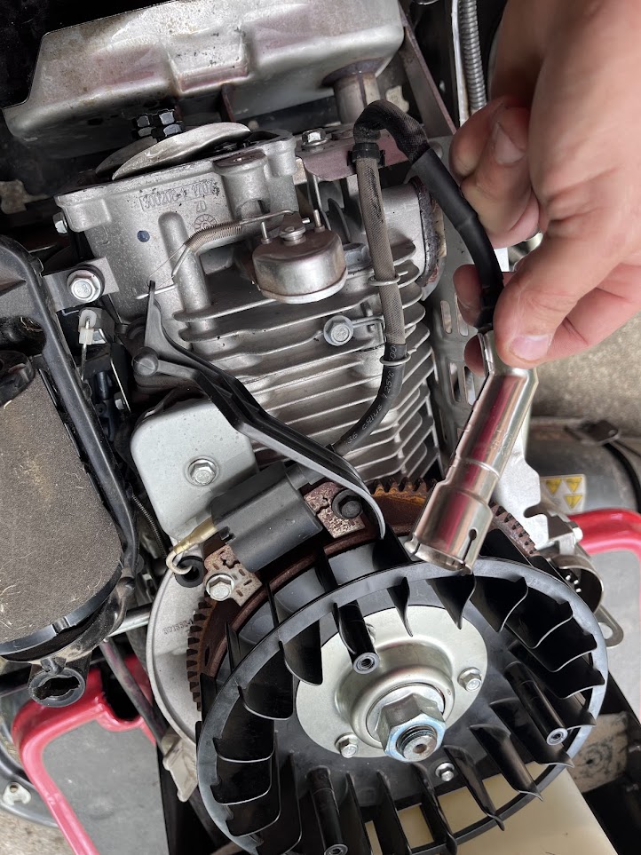 Spark plug and flywheel service